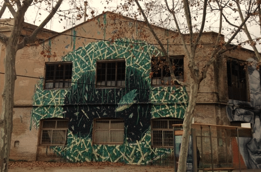 You can find this mural in one of those streets in Barcelona that are full of urban art